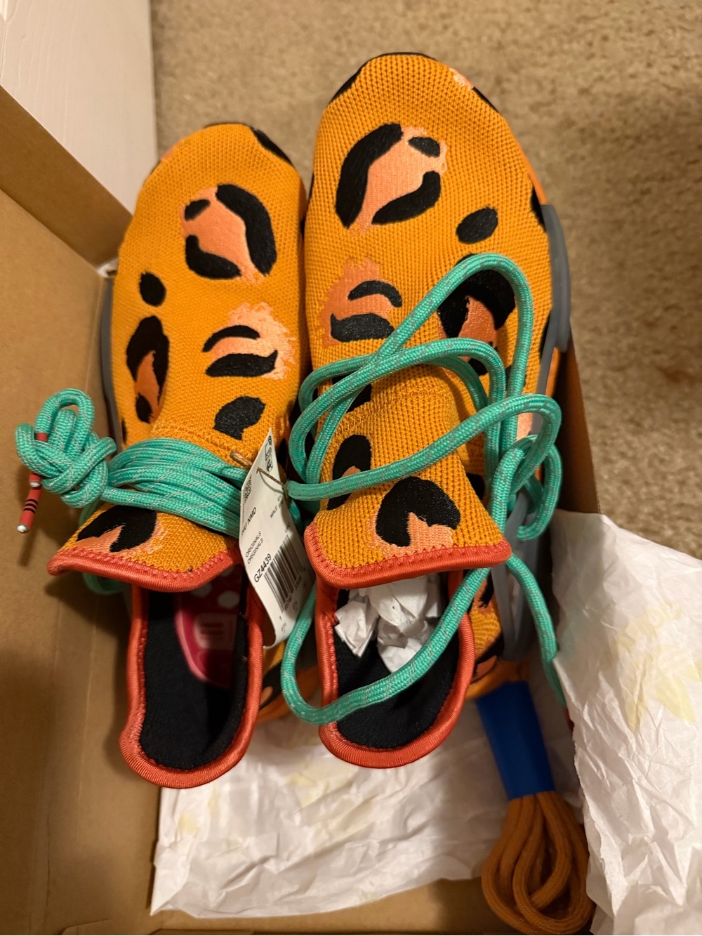 Orange Leopard Print Slip-On Sneakers with Teal Laces